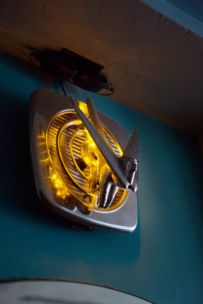 Vintage metal sculpture with custom lighting from Drury Designs Inc. in Green Bay restaurant Vintage Cantina